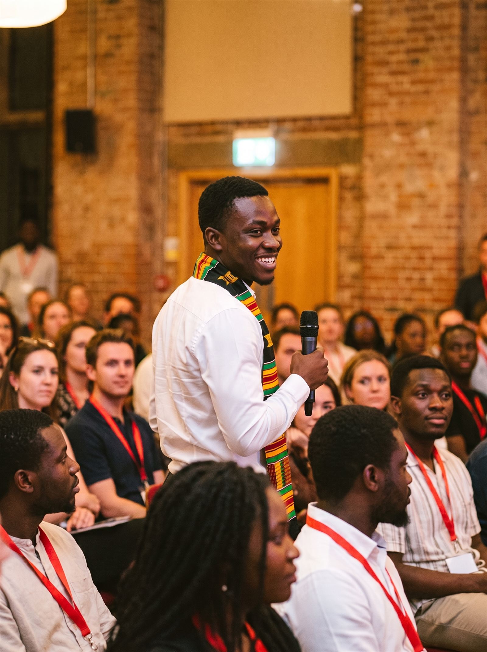 A delegate asking a question from the audience