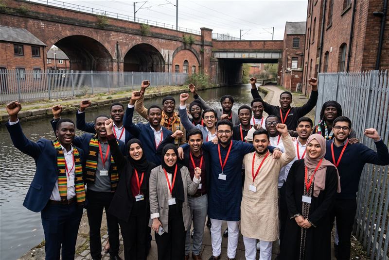 Delegates celebrating together outdoors